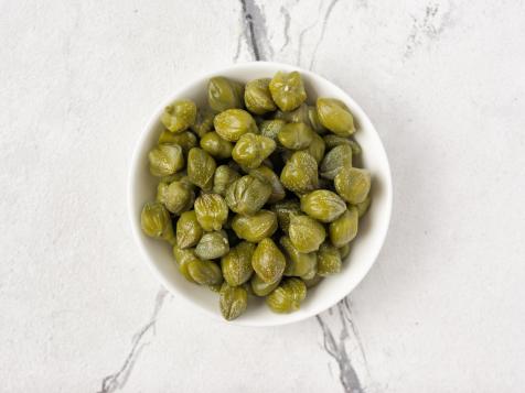 What Does Capers Taste Like: Exploring this Tangy Ingredient